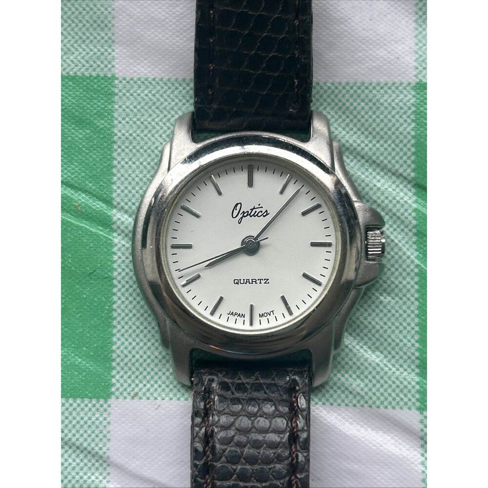 Optics Silver Tone Leather Band Women’s Quartz Watch